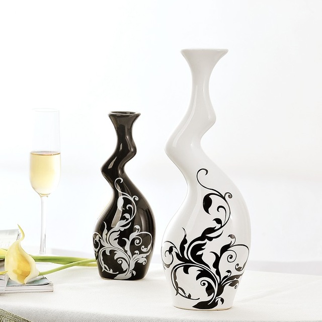 http://www.beachgrovekaiapoi.co.nz/images/cate_18/640/1-pair-Home-Furnishing-modern-decoration-black-and-white-color-decoration-pottery-twisted-vases-with-flower-pattern-TUIQ6634-mpb0.jpg