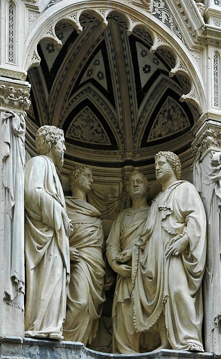 https://upload.wikimedia.org/wikipedia/commons/thumb/4/41/Four_Crowned_Saints_Nanni_di_Banco_Orsanmichele.jpg/440px-Four_Crowned_Saints_Nanni_di_Banco_Orsanmichele.jpg